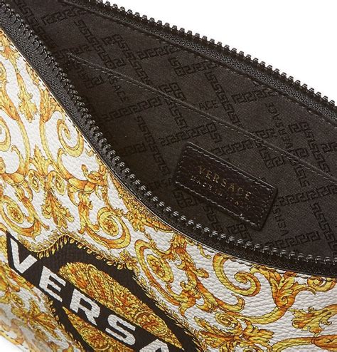 versace printed full-grain leather pouch|versace clutch bags.